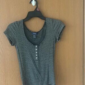 Small black and white stripped tee shirt